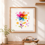 Finished rainbow watercolor daisy cross stitch artwork displayed as home decor