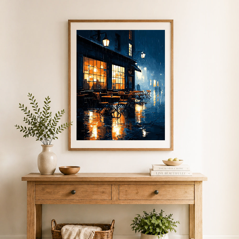 Finished rainy city cafe evening cross stitch artwork displayed as home decor