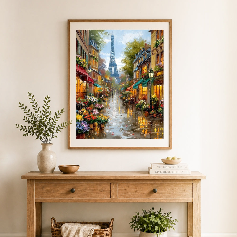 Finished rainy paris street with eiffel tower cross stitch artwork displayed as home decor