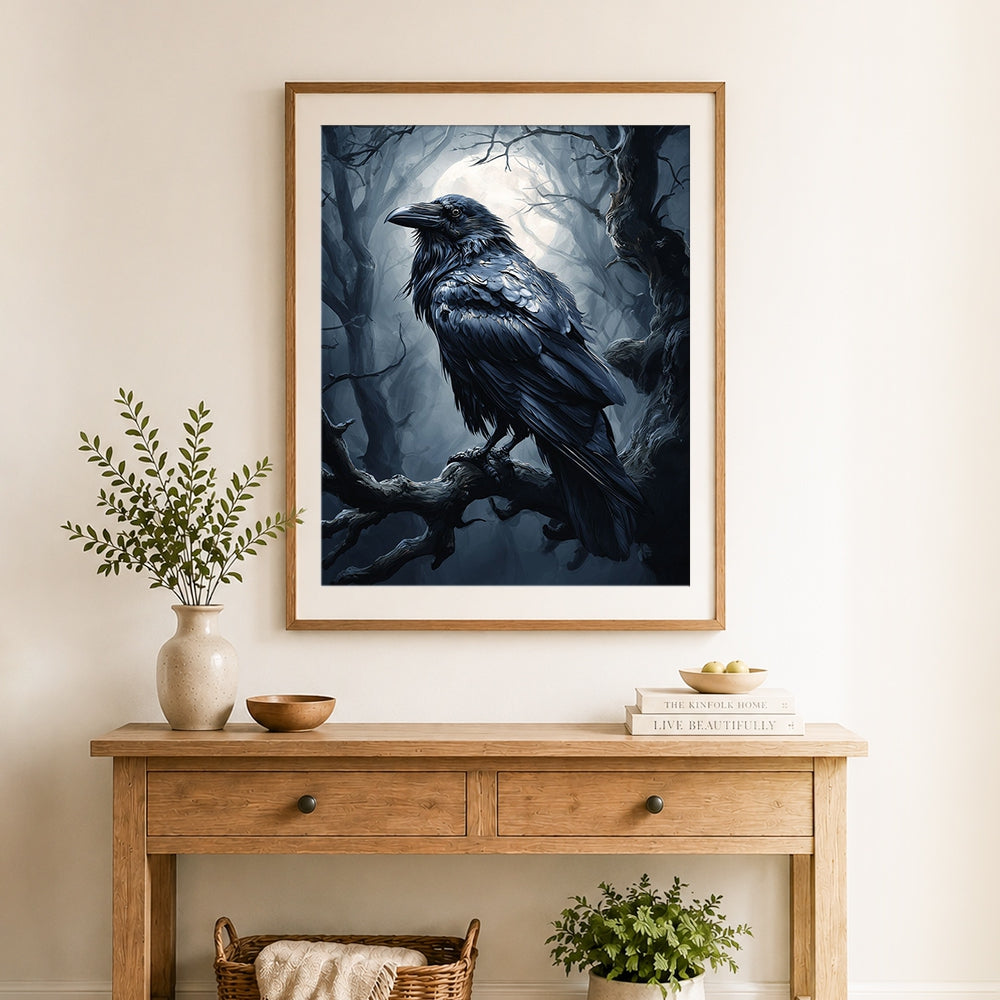 Finished raven on haunted branch cross stitch artwork displayed as home decor