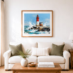 Finished red and white lighthouse against crashing waves cross stitch artwork displayed as home decor