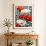 Finished red and white poppies cross stitch artwork displayed as home decor
