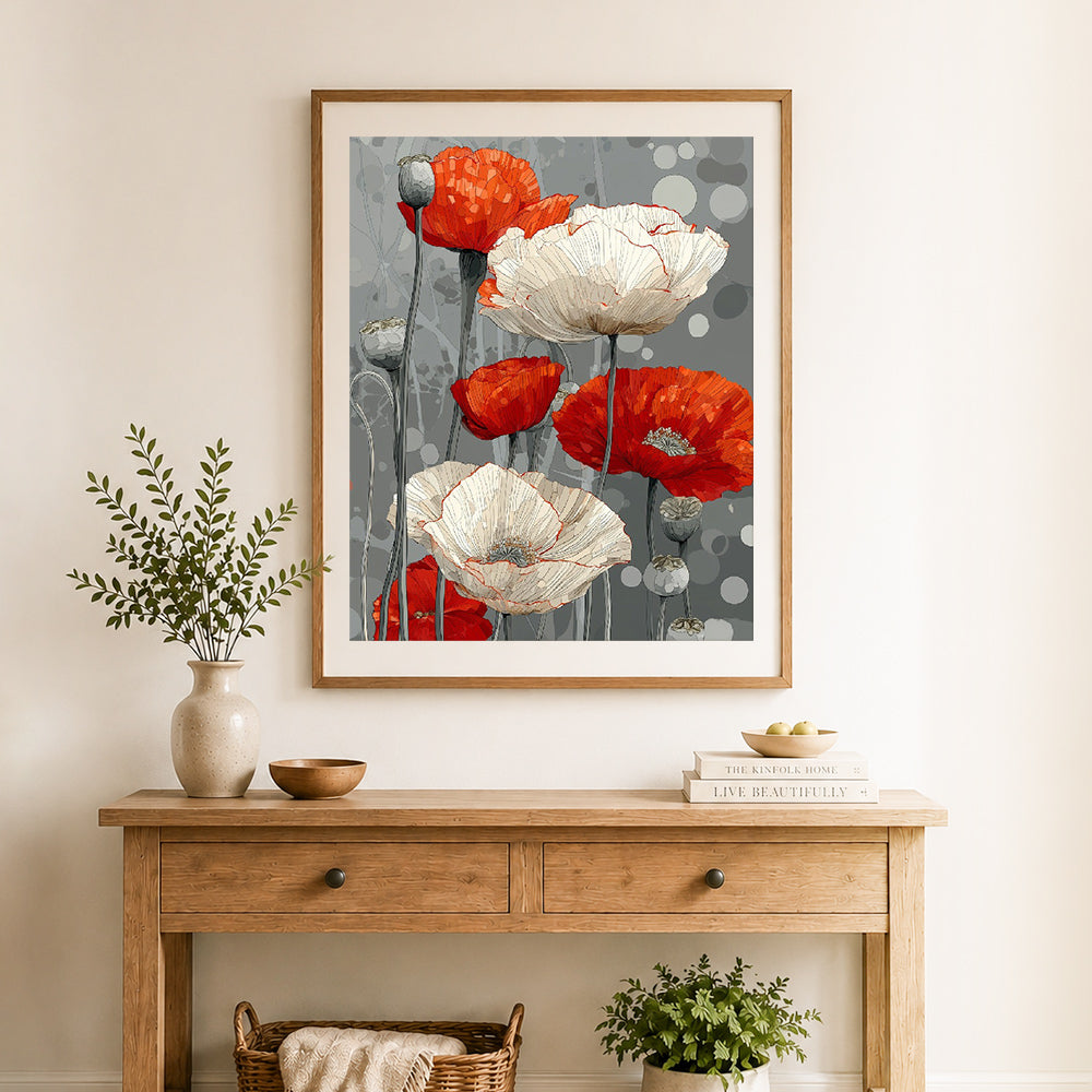 Finished red and white poppies cross stitch artwork displayed as home decor