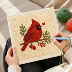 Creating handmade red cardinal with heart punch needle artwork