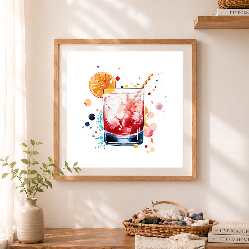 Finished red cocktail watercolor cross stitch artwork displayed as home decor