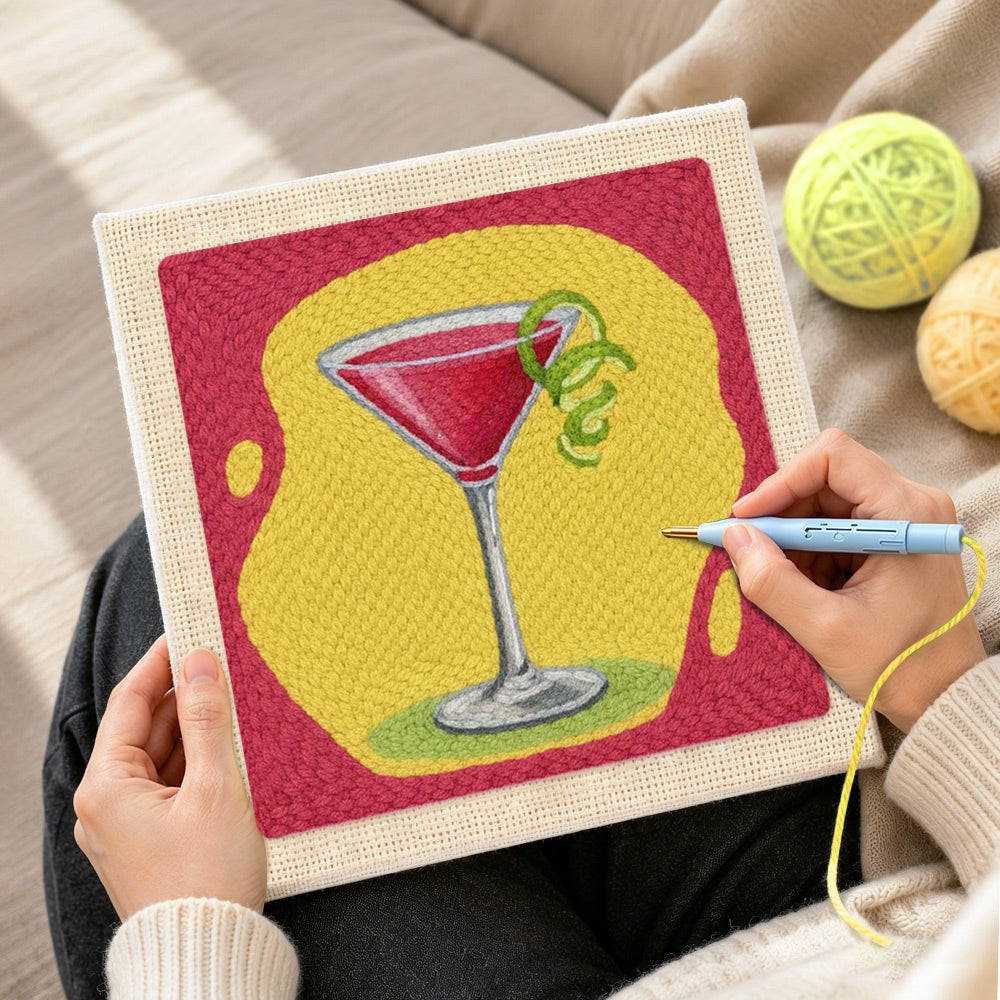 Creating handmade red cocktail with lime punch needle artwork