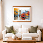 Finished red double decker bus in rainy london cross stitch artwork displayed as home decor
