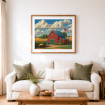 Finished red farmhouse in golden corn cross stitch artwork displayed as home decor