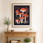 Finished red fly agaric mushrooms cross stitch artwork displayed as home decor