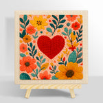 Red heart surrounded by colorful blooms punch needle kit for beginners
