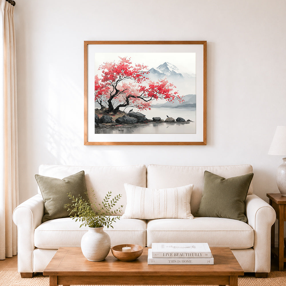 Finished red leaf tree and snowy mountain cross stitch artwork displayed as home decor