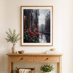 Finished red roses on rainy street cross stitch artwork displayed as home decor