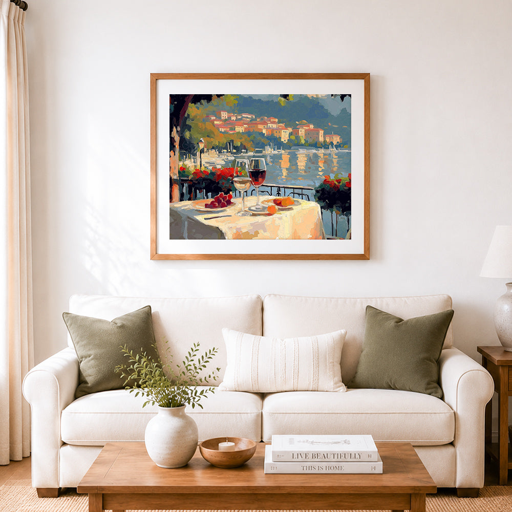 Finished red wine in a seaside town cross stitch artwork displayed as home decor
