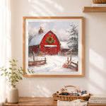 Finished red winter barn with christmas wreath cross stitch artwork displayed as home decor