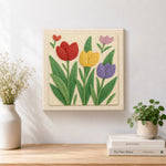 Finished red, yellow and purple tulip flowers artwork displayed on a wall