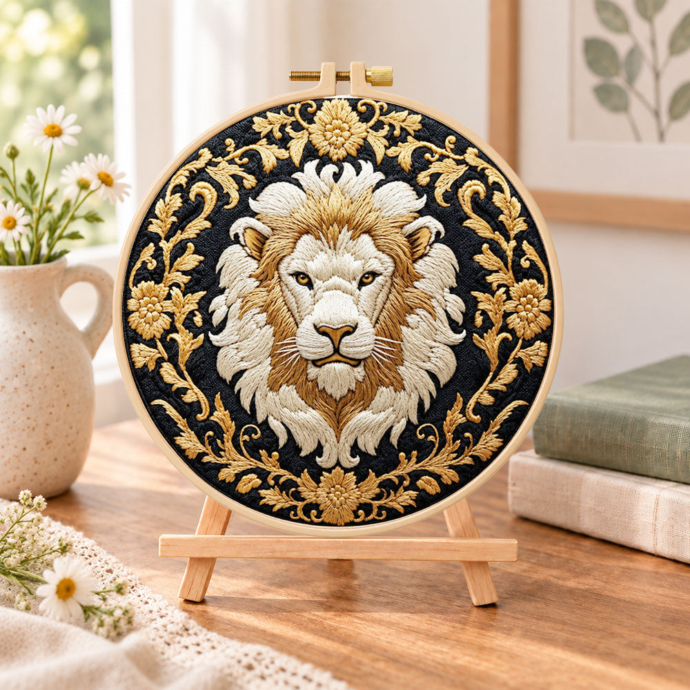 Regal golden lion embroidery kit finished hoop displayed on a wooden stand as cozy tabletop decor