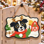Reindeer border collie paint by numbers door hanger on a garden gate