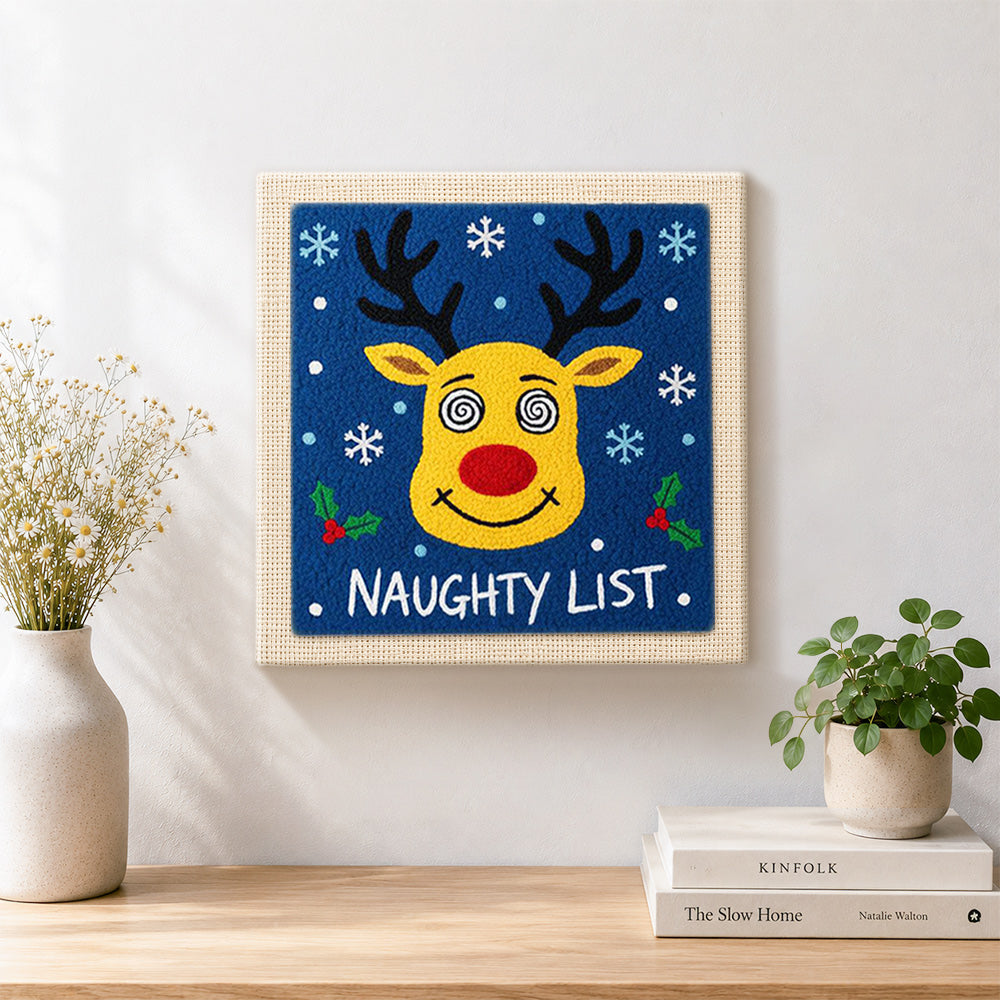 Finished reindeer naughty list art artwork displayed on a wall