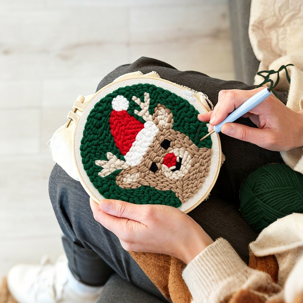 Creating handmade reindeer with santa hat unch needle artwork