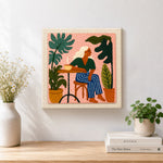 Finished relaxing woman and houseplants artwork displayed on a wall