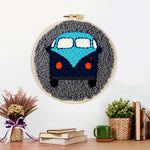 Finished retro blue campervan artwork displayed on a wall