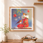 Finished robins on christmas stocking cross stitch artwork displayed as home decor