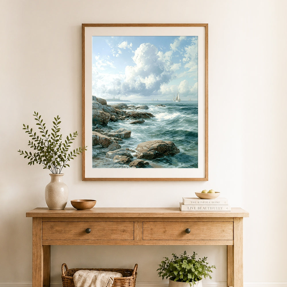 Finished rocky coastline with sailboats cross stitch artwork displayed as home decor
