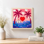 Finished romantic cat couple, heart sunset and palm trees artwork displayed on a wall