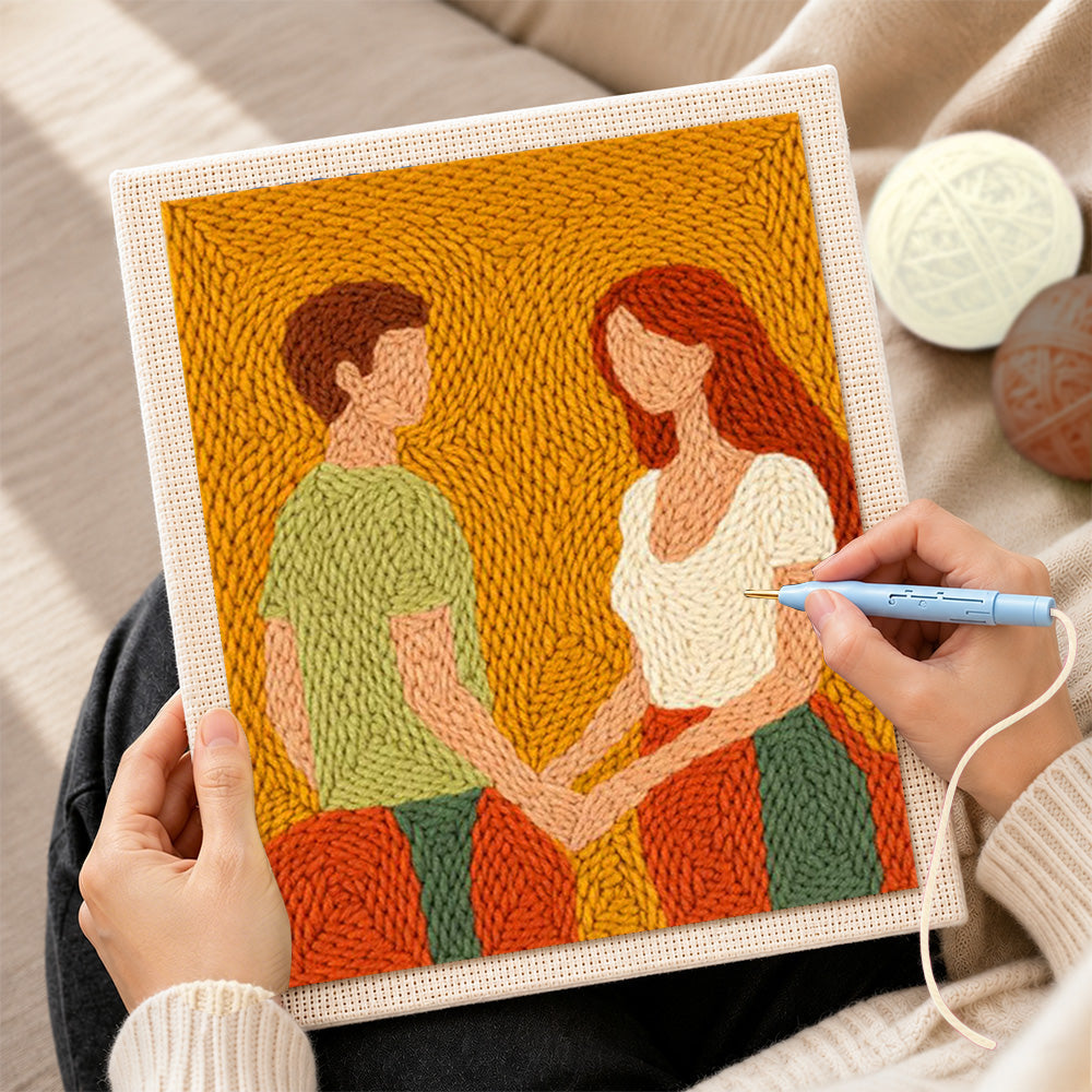 Creating handmade romantic couple holding hands punch needle artwork