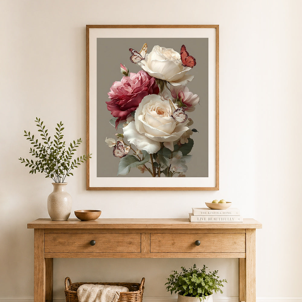 Finished roses and butterflies cross stitch artwork displayed as home decor