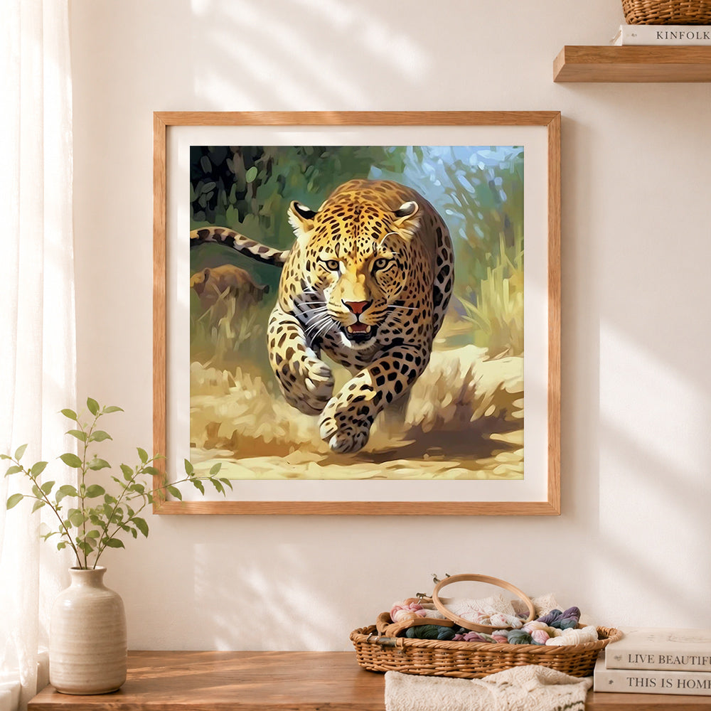 Finished running leopard in savanna cross stitch artwork displayed as home decor