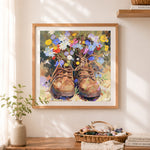 Finished rustic boots filled with wildflowers cross stitch artwork displayed as home decor