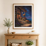 Finished rustic cabin night glow cross stitch artwork displayed as home decor