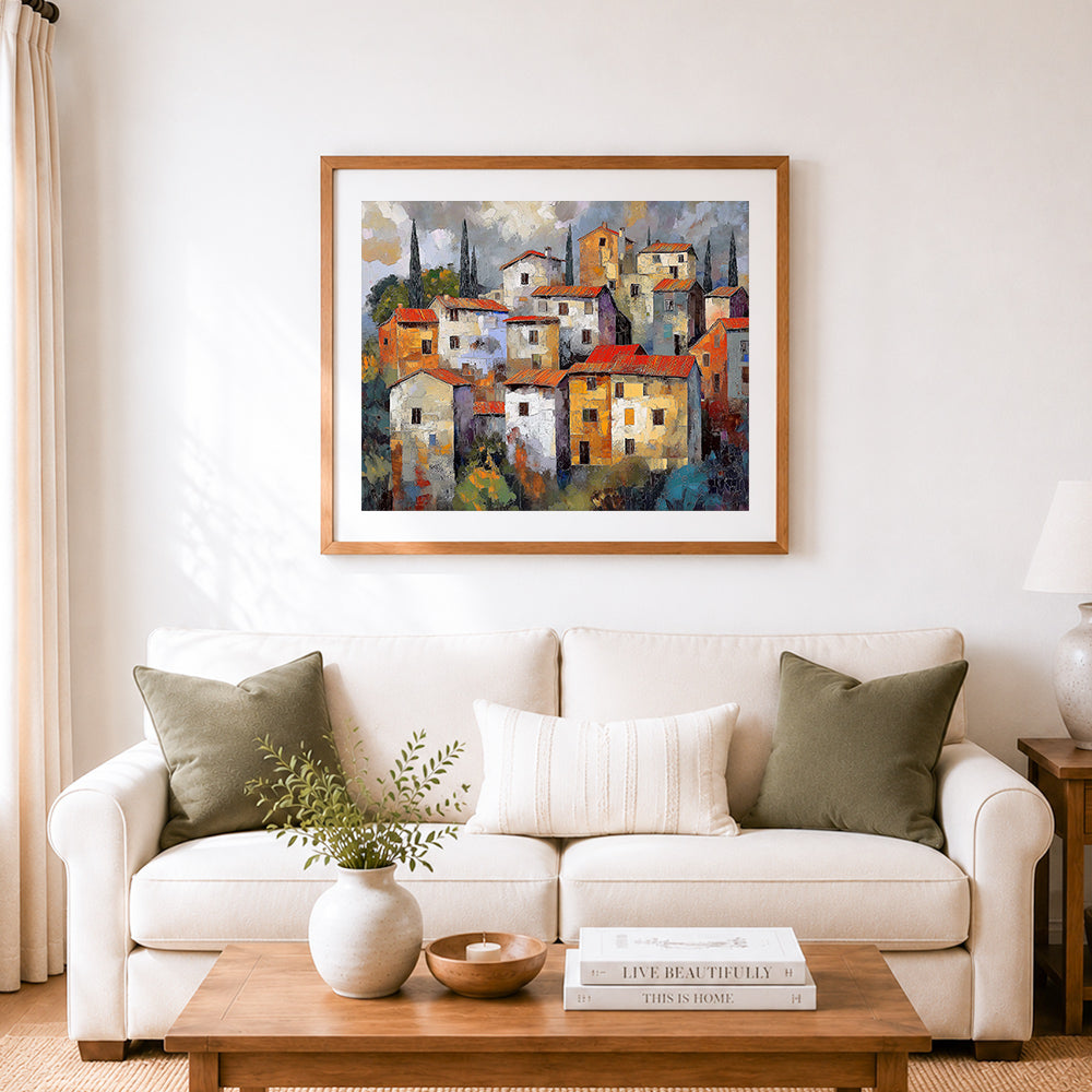 Finished rustic tuscan hill village cross stitch artwork displayed as home decor