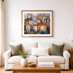 Finished rustic tuscan hill village cross stitch artwork displayed as home decor