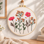 Rustic wild stems embroidery hoop wall art displayed as warm and cozy handmade home decor