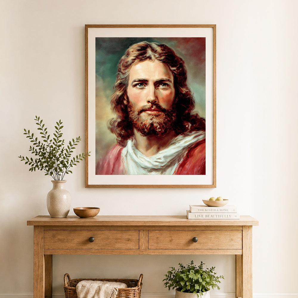 Finished sacred gentle portrait cross stitch artwork displayed as home decor