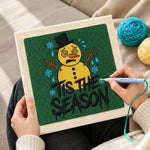 Creating handmade sad melting snowman art punch needle artwork