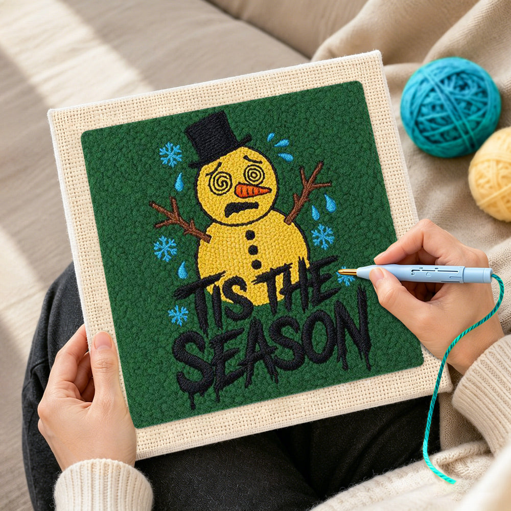 Creating handmade sad melting snowman art punch needle artwork