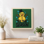Finished sad melting snowman art artwork displayed on a wall