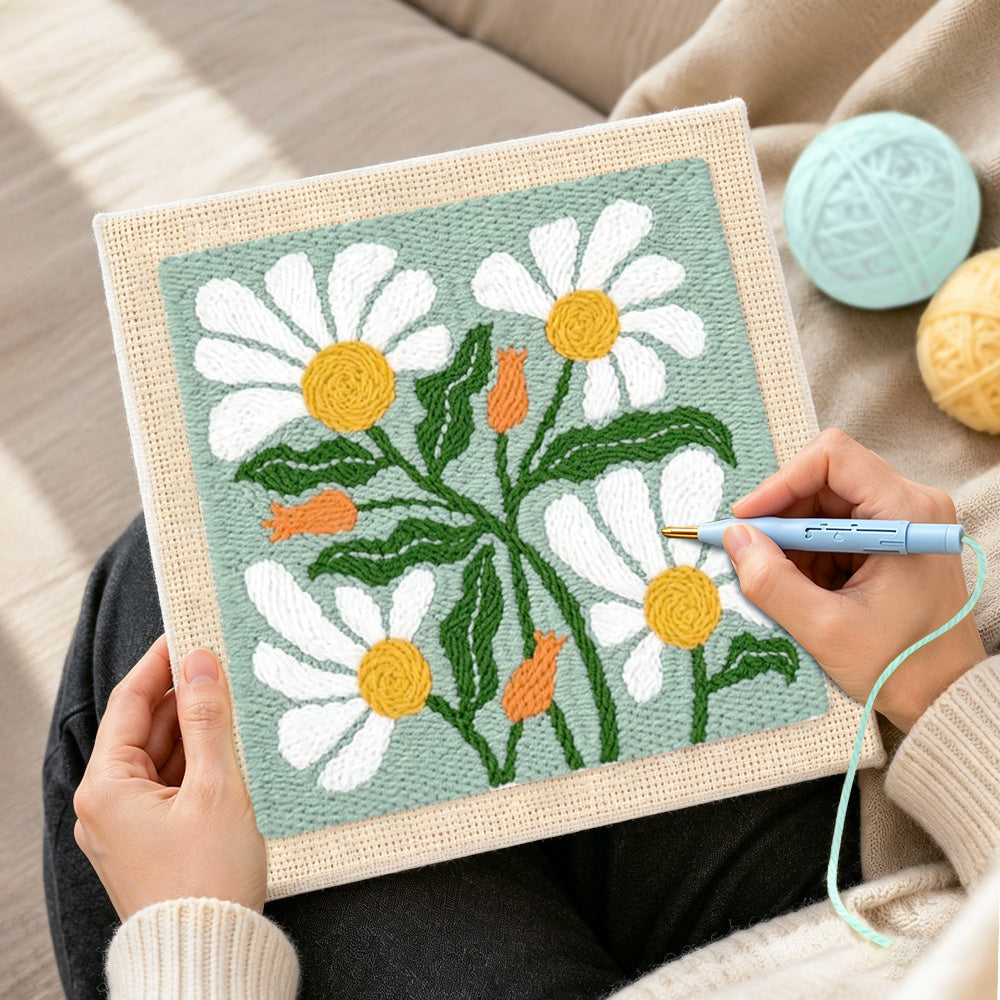 Creating handmade sage green daisies punch needle artwork