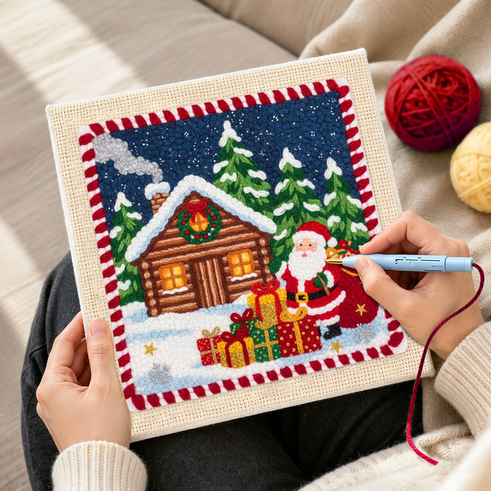 Creating handmade santa and cabin christmas punch needle artwork