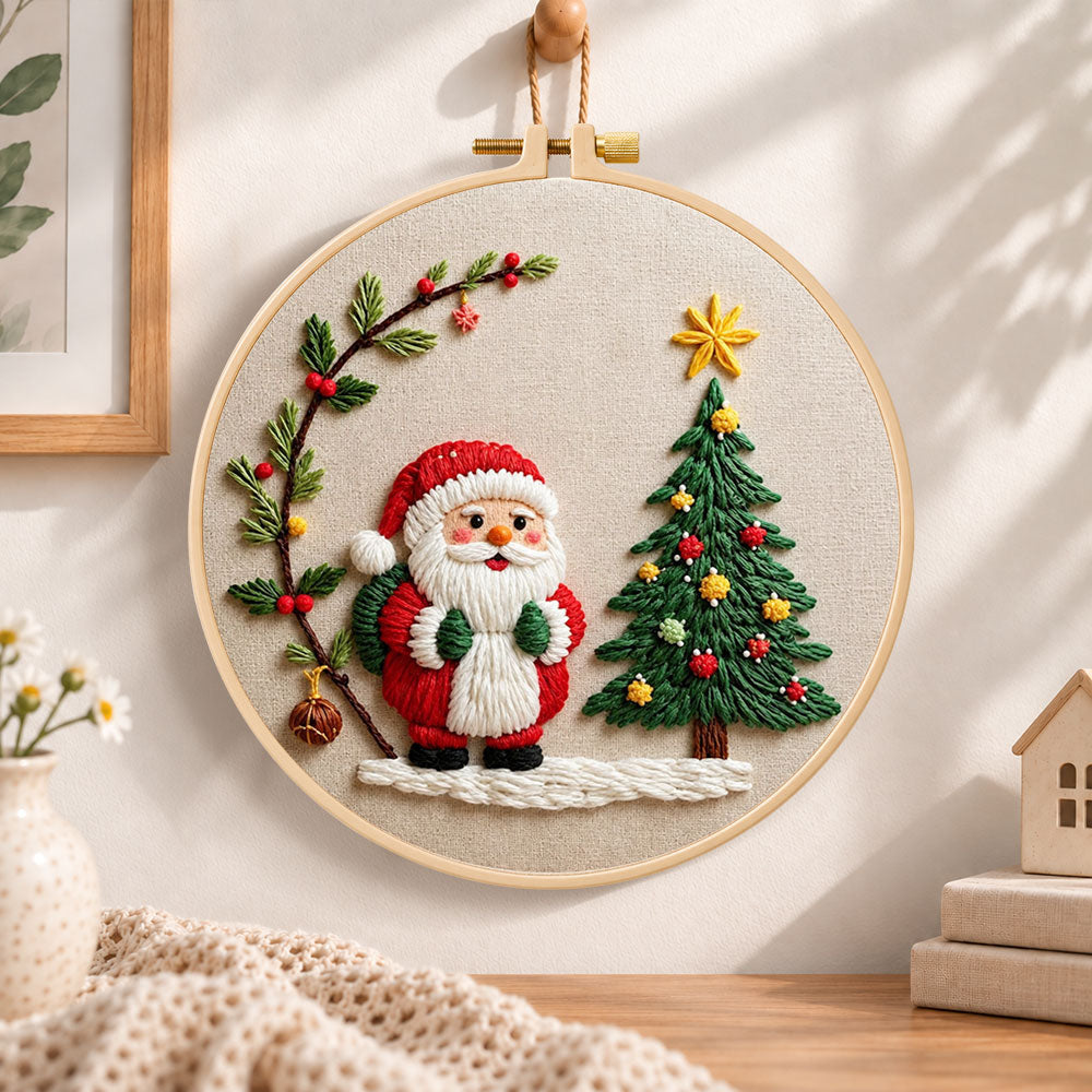 Santa and christmas tree embroidery hoop wall art displayed as warm and cozy handmade home decor