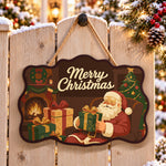 Santa by fireplace paint by numbers door hanger on a garden gate