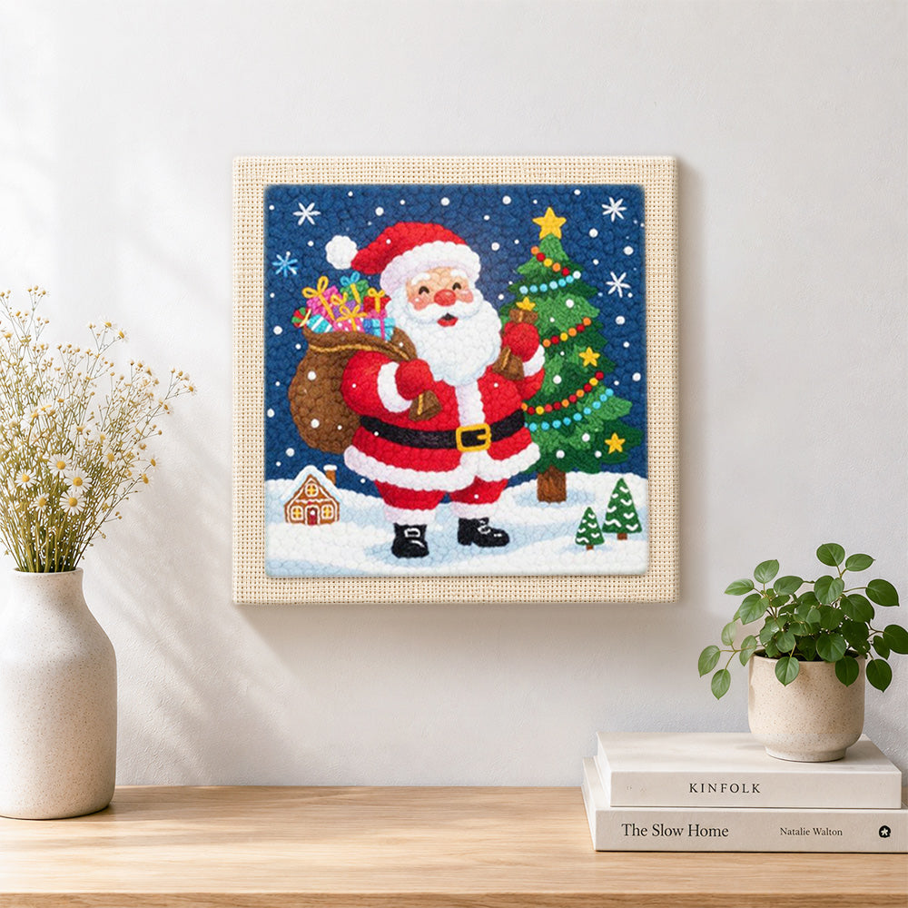 Finished santa claus with gift sack artwork displayed on a wall