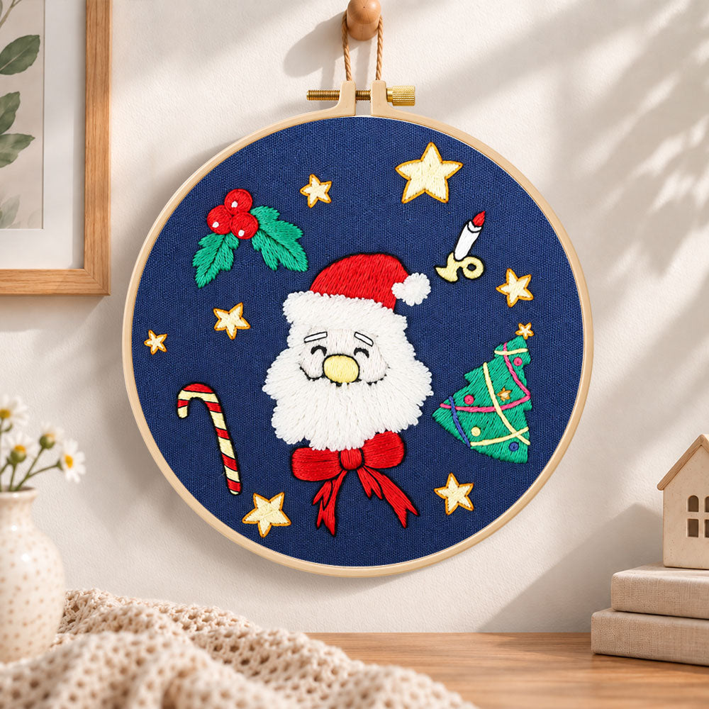 Santa face design embroidery hoop wall art displayed as warm and cozy handmade home decor
