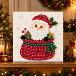 Finished santa hiding in gift sack pearl diamond painting artwork displayed as holiday home decor