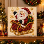 Finished santa riding golden sleigh pearl diamond painting artwork displayed as holiday home decor