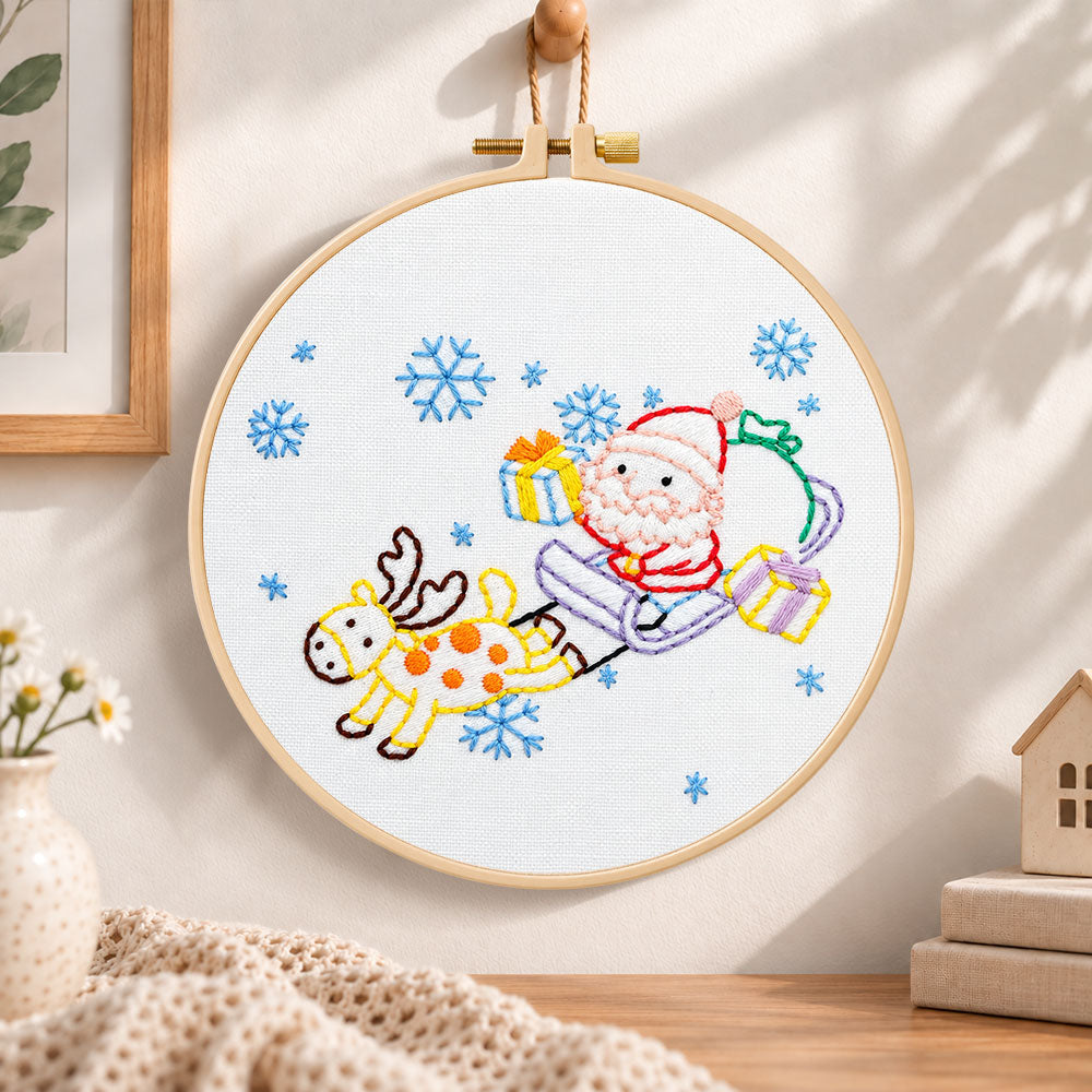 Santa sleigh ride embroidery hoop wall art displayed as warm and cozy handmade home decor