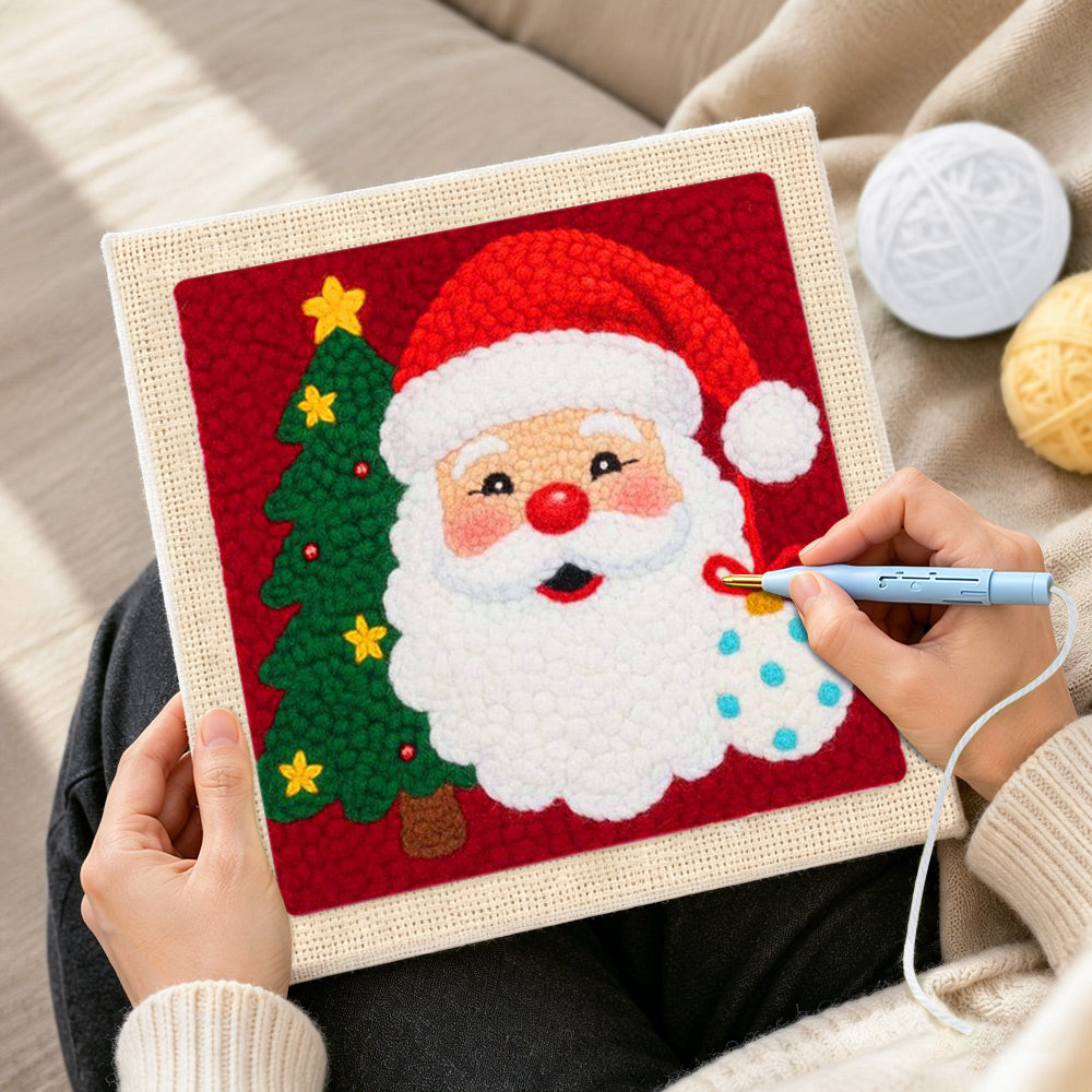 Creating handmade santa with christmas tree punch needle artwork